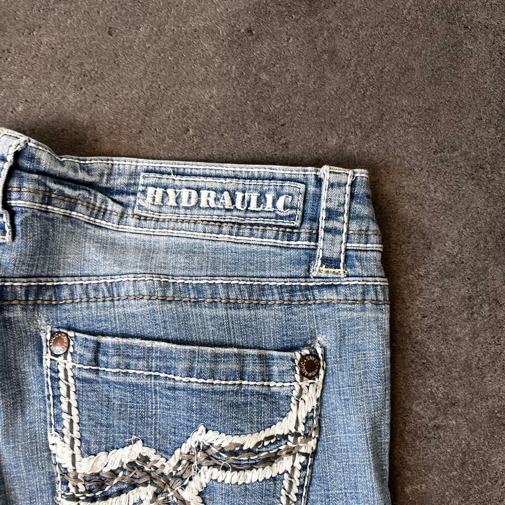 Vintage Y2K Bootcut Jeans Damen Hellblau mit Flügel-Stickerei – L