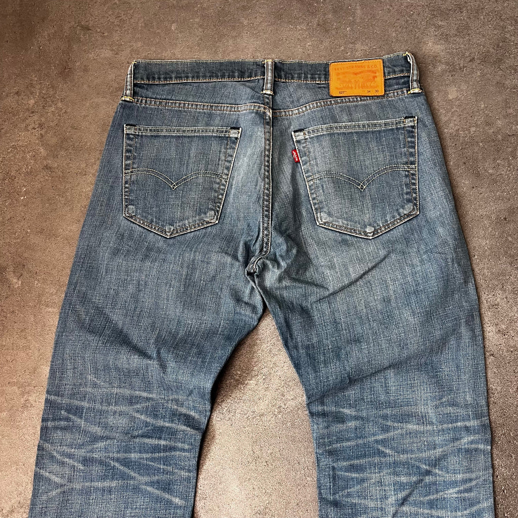 Vintage Levi's 527 Bootcut Jeans Herren Mittelblau Washed – W34 L30
